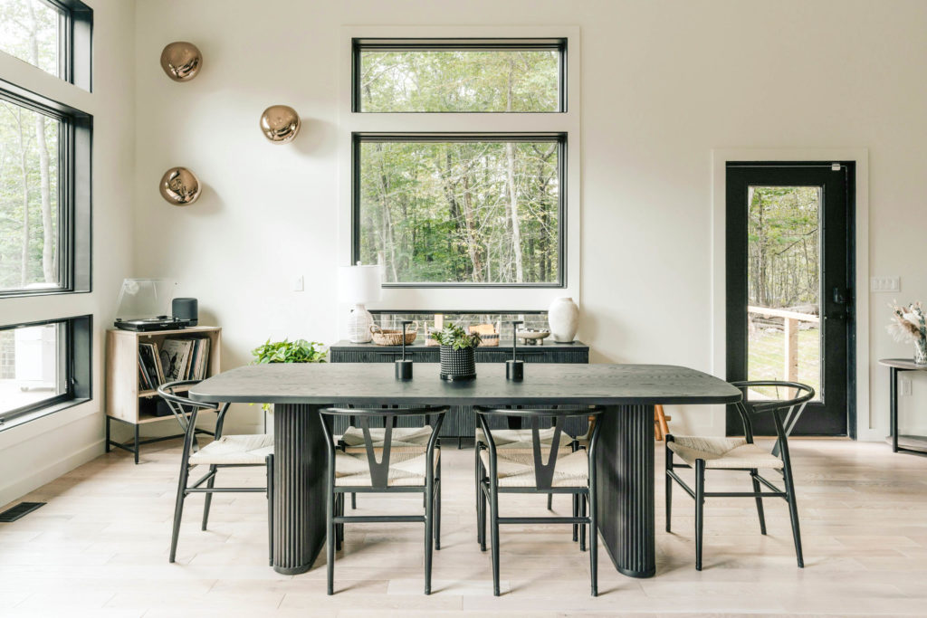 2025 interior design trends - black dining chairs - black Wishbone Chair