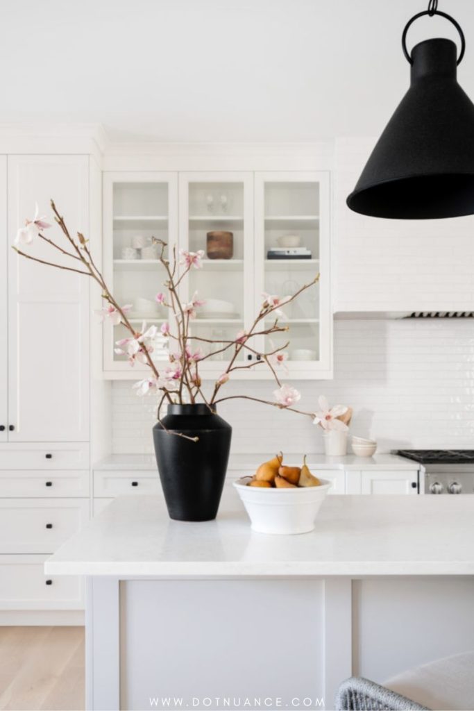 Flower arrangement ideas - cherry blossom flowers in the kitchen counter