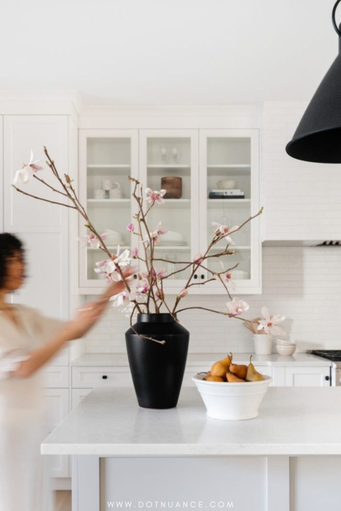 cherry blossom in black vase