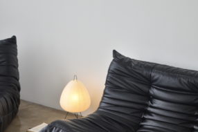 Black togo sofa - vitra akari floor lamp - ambient accent light