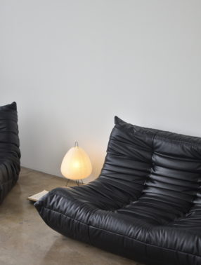 Black togo sofa - vitra akari floor lamp - ambient accent light