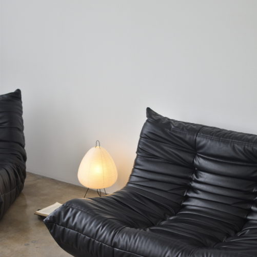 Black togo sofa - vitra akari floor lamp - ambient accent light