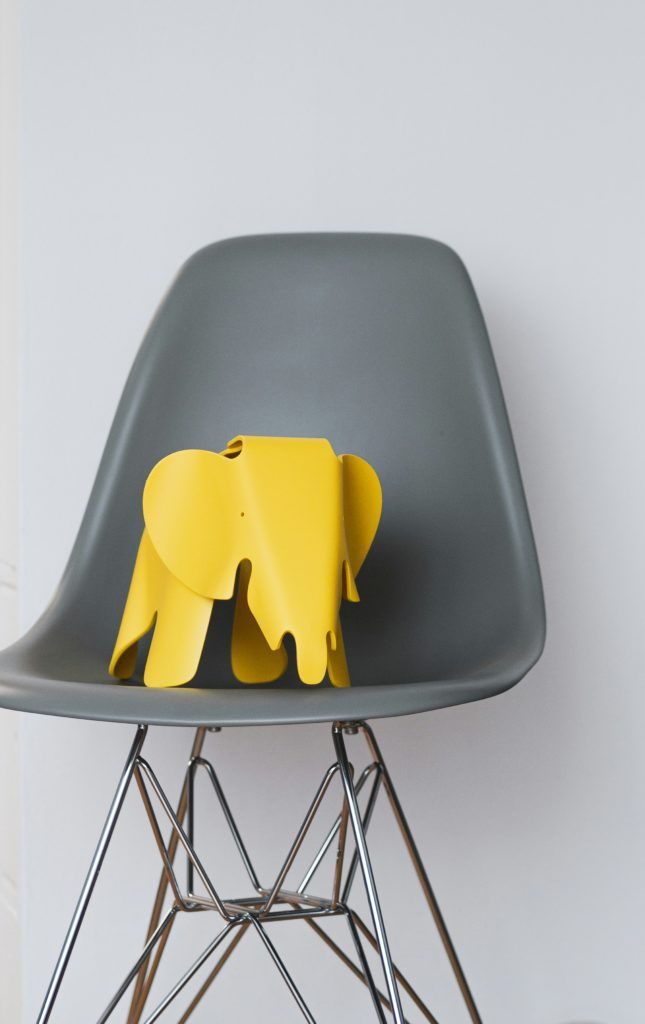 The Elephant on the Eames Molded Plastic Chair by Charles and Ray Eames