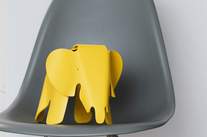 Elephant on the Eames Molded Plastic Chair by Charles and Ray Eames